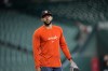 Houston Astros' Carlos Correa walks to the dugout after fielding ground balls before a baseball game against the Chicago White Sox Thursday, Sept. 3, 2026, in Houston. (AP Photo/David J. Phillip)