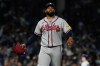 Atlanta Braves starting pitcher Reynaldo López walks to the dugout after the second inning of a baseball game against the Chicago Cubs in Chicago, Monday, Sept. 14, 2026. (AP Photo/Nam Y. Huh)