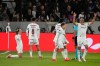 Agustin Canobbio of Brazil's Fluminense, left, celebrates with teammates after scoring his side's opening goal against Argentina's Platense during a Copa Libertadores quarter final second leg soccer match in Buenos Aires, Argentina, Tuesday, Sept. 15, 2026. (AP Photo/Gustavo Garello)