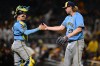 Milwaukee Brewers pitcher Trevor Megill is congratulated by catcher William Contreras after the Brewers defeated the Pittsburgh Pirates in a baseball game, Tuesday, Sept. 15, 2026, in Pittsburgh. (AP Photo/David Dermer)