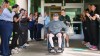 Caregivers clap out Ryan Lasko, a minor league prospect with the Athletics who was paralyzed in an outfield collision more than two months ago, upon his discharge from Kessler Institute for Rehabilitation in West Orange, N.J., Wednesday, Sept. 16, 2026. (AP Photo/Matt Rourke)