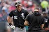 Chicago White Sox's Colson Montgomery (12) is checked out after being hit by a pitch in the fourth inning of a baseball game against the Cleveland Guardians in Cleveland, Wednesday, Sept. 16, 2026. (AP Photo/Sue Ogrocki)