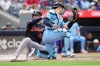 Toronto Blue Jays catcher Brandon Valenzuela (59) tries to tag out Detroit Tigers Colt Keith (33) as he scores a run during first inning MLB baseball action in Toronto on Wednesday, Sept. 16, 2026.  THE CANADIAN PRESS/Nathan Denette