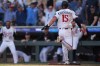 Minnesota Twins' Luke Keaschall (15) scores the game-winning run on a single by Victor Caratini in the 13th inning of a baseball game against the New York Yankees, Wednesday, Sept. 16, 2026, in Minneapolis. (AP Photo/Abbie Parr)