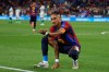 Barcelona's Raphinha celebrates after scoring his side's second goal from the penalty spot during a Spanish La Liga soccer match between Barcelona and Racing de Santander in Barcelona, Spain, Wednesday, Sept. 16, 2026. (AP Photo/Joan Monfort)