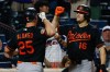 Baltimore Orioles Pete Alonso (25) celebrates a solo home run with his teammate Coby Mayo (16) during the first inning of a baseball game against the New York Mets, Wednesday, Sept. 16, 2026, in New York. (AP Photo/Eduardo Munoz Alvarez)
