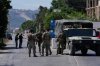 Lebanese army soldiers stand guard at a checkpoint near the border with Israel in the southern village of Mansouri, Lebanon, Friday, Sept. 4, 2026. (AP Photo/Mohammed Zaatari)