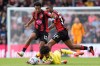 Brentford's Kevin Schade is challenged by Bournemouth's Tyler Adams, left, and Rayan during the English Premier League soccer match between Bournemouth and Brentford in Bournemouth, England, Saturday Sept. 12, 2026. (Andrew Matthews/PA via AP)