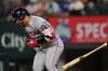 Boston Red Sox's Willson Contreras drops his bat after being hit by a pitch thrown by Texas Rangers' Nathan Eovaldi in the sixth inning of a baseball game Wednesday, Sept. 16, 2026, in Arlington, Texas. (AP Photo/Tony Gutierrez)