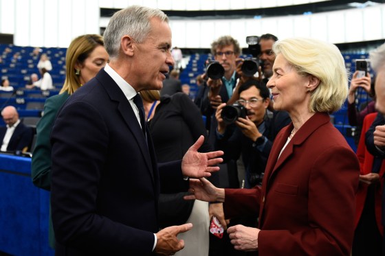 Prime Minister Mark Carney, front left, speaks with European Commission President Ursula von der Leyen at the European Parliament on Sept. 17. (Pascal Bastien / The Associated Press files)