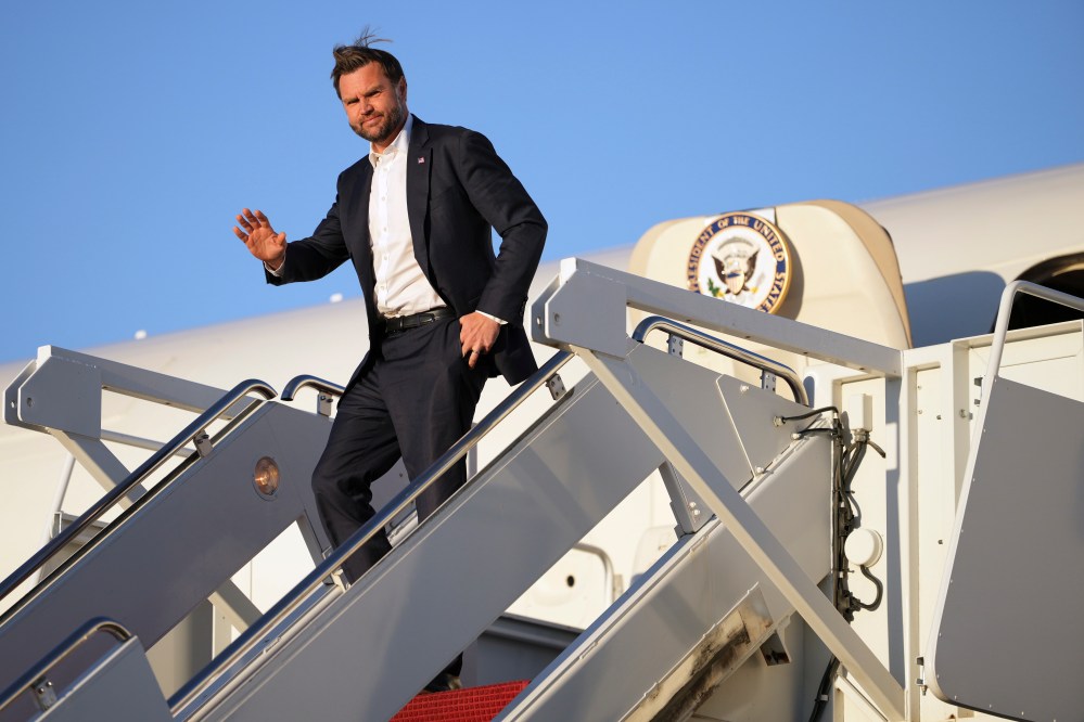 Vice President J.D. Vance waves as he arrives on Air Force Two, Monday, Sept. 14, 2026, at Joint Base Andrews, Md. (AP Photo/Mark Schiefelbein, Poole)