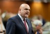 Conservative MP Larry Brock speaks on Parliament Hill in Ottawa, Monday, June 15, 2026. THE CANADIAN PRESS/Adrian Wyld