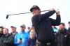 Patrick Reed of the United States tees off the 2nd on day two of the Irish Open at Trump International Golf Links in Doonbeg, Ireland, Friday Sept. 11, 2026. (Brian Lawless/PA via AP)