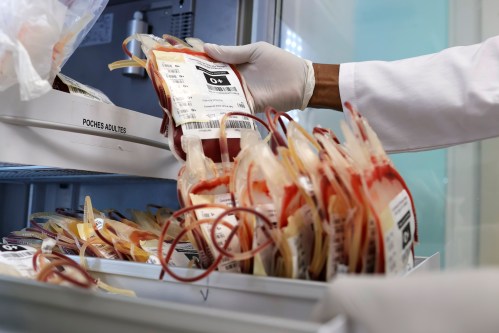 A specialist handles blood bags inside a laboratory at a hospital during a regional congress focused on strengthening laboratory capacity and preparedness following lessons from Ebola and COVID-19, in Lome, Togo, Wednesday, Sept. 16, 2026. (AP Photo/Erick Kaglan)