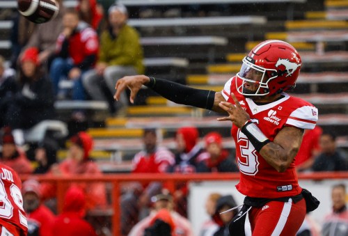 Calgary Stampeders quarterback Vernon Adams Jr. throws the football during first half CFL football action against the B.C. Lions in Calgary, Thursday, Aug. 13, 2026. THE CANADIAN PRESS/Jeff McIntosh