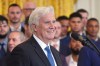 FILE - Los Angeles Dodgers owner and chairman Mark Walter speaks during a ceremony to honor the Major League Baseball 2024 World Series Champion team in the East Room of the White House, April 7, 2025, in Washington. (AP Photo/Evan Vucci, File)