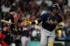 Atlanta Braves' Ronald Acuña Jr. tosses his bat after hitting a home run during the seventh inning of a baseball game against the Houston Astros in Houston, Friday, Sept. 18, 2026. (AP Photo/Ashley Landis)