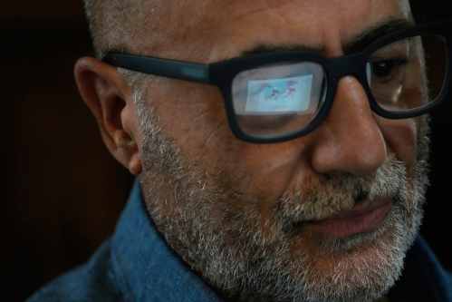 Antonino Bella, a senior researcher at the Infectious Diseases Department of the Italian National Institute of Health, looks at a map of Italy showing provinces with confirmed circulation of West Nile virus in vectors, animals, and humans during the 2026 season, in Rome, Friday, Sept. 18, 2026. (AP Photo/Gregorio Borgia)