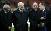 FILE - Inter Milan's former players Sandro Mazzola, second left, with Jair of Brazil, left, Mario Corso and Luis Suarez, right, prior to the start of the Champions League first knockout round, second leg soccer match between Inter and Ajax at the San Siro stadium in Milan, Italy, March 14, 2006. (AP Photo/Luca Bruno, File)