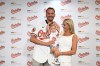 Former Baltimore Oriole Trey Mancini poses with his wife Sara Perlman and daughter Sadie after announcing his retirement as an Oriole during a news conference on Saturday, Sept. 19, 2026 in Baltimore. (AP Photo/Gail Burton)