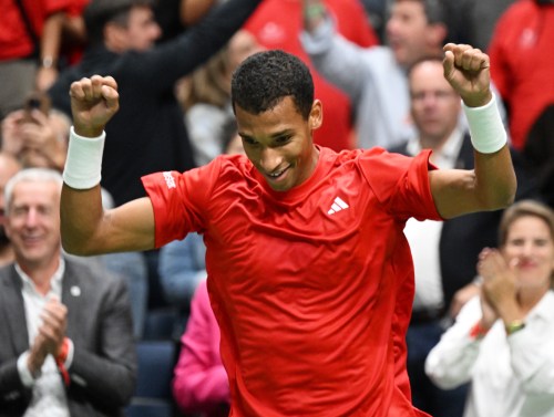 Felix Auger-Aliassime of Canada celebrates his win against Quentin Halys of France during a Davis Cup qualifier second round match at the Videotron Centre in Quebec City, Friday, Sept. 18, 2026. THE CANADIAN PRESS/Jacques Boissinot