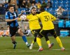 CF Montreal's Luca Petrasso (left) vies for the ball with Columbus Crew's Steven Moreira (31) and Mohamed Farsi (23) during first half MLS soccer action in Montreal on Saturday Sept. 19, 2026. THE CANADIAN PRESS/Peter McCabe