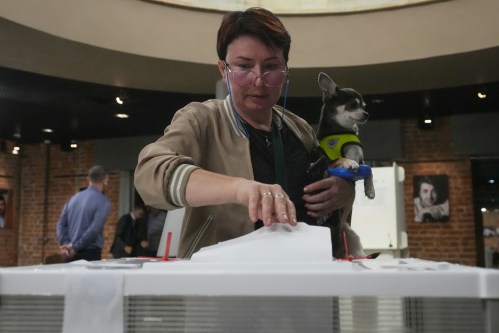 A voter casts a ballot in the parliamentary election in Moscow, Sunday, Sept. 20, 2026. (AP Photo/Pavel Bednyakov)