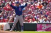 Chicago Cubs' Alex Bregman celebrates after a one-run single during the first inning of a baseball game against the Cincinnati Reds, Sunday, Sept. 20, 2026, in Cincinnati. (AP Photo/Kareem Elgazzar)