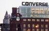 FILE - The Converse logo is displayed on the roof of the company's world headquarters in the West End neighborhood of Boston, Wednesday, Dec. 28, 2016. (AP Photo/Charles Krupa, file)