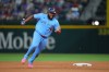 Toronto Blue Jays first baseman Vladimir Guerrero Jr. runs from first to third base on a hit by teammate Alejandro Kirk against the Texas Rangers during the eighth inning of a baseball game Saturday, Sept. 19, 2026, in Arlington, Texas. (AP Photo/Julio Cortez)
