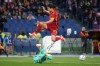 FILE - Bologna's goalkeeper Lukasz Skorupski, bottom, saves the ball from Roma's Sardar Azmoun, top, during an Italian Serie A soccer match at Rome's Olympic Stadium, April 22, 2024. (AP Photo/Gregorio Borgia, File)