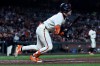 San Francisco Giants' Drew Gilbert watches his two-run single during the second inning of a baseball game against the Minnesota Twins in San Francisco, Monday, Sept. 21, 2026. (AP Photo/Jed Jacobsohn)