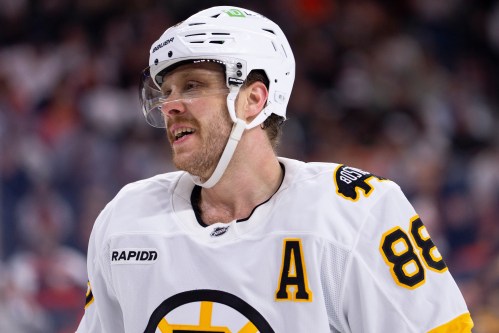 FILE - Boston Bruins' David Pastrnak looks on during the second period of an NHL hockey game against the Philadelphia Flyers, Feb. 28, 2026, in Philadelphia. (AP Photo/Chris Szagola, File)