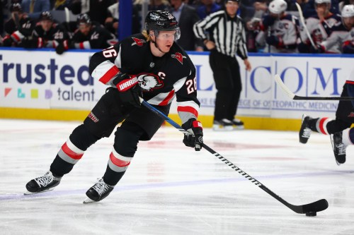 FILE - Buffalo Sabres defenseman Rasmus Dahlin (26) carries the puck over the blue line during the first period of an NHL hockey game against the Columbus Blue Jackets, April 9, 2026, in Buffalo, N.Y. (AP Photo/Jeffrey T. Barnes, File)