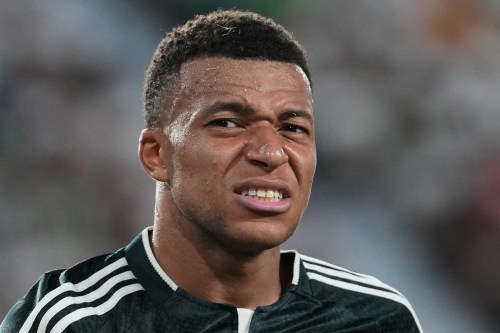 Real Madrid's Kylian Mbappe grimaces during the Spanish La Liga soccer match between Elche and Real Madrid in Elche, Spain, Tuesday, Sept. 15, 2026. (AP Photo/Alberto Saiz)