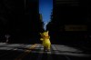 Kaito, of Atlanta, walks in a Pokemon, Pikachu costume during the Dragon Con parade on Saturday, Aug. 31, 2024, in Atlanta. (AP Photo/Brynn Anderson)