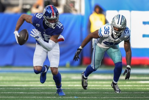 FILE - New York Giants wide receiver Darius Slayton (18) carries the ball against Dallas Cowboys cornerback Corey Ballentine (36) during the second quarter of an NFL football game, Sunday, Jan. 4, 2026, in East Rutherford, N.J. (AP Photo/Frank Franklin II, File)
