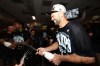 Tampa Bay Rays pitcher Nick Martinez celebrates in the locker room after the Rays defeated the New York Yankees to win the AL East Division after the second baseball game of a doubleheader Tuesday, Sept. 22, 2026, in New York. (AP Photo/Adam Hunger)
