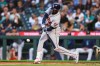 Houston Astros designated hitter Yordan Alvarez (44) hits an RBI single in the first inning of a baseball game against the Seattle Mariners, Tuesday, Sept. 22, 2026, in Seattle. (AP Photo/Kevin Ng)