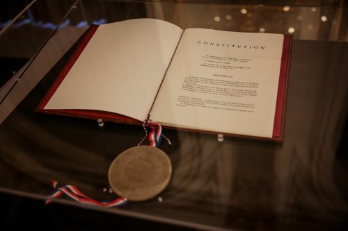 The text of the French Constitution is on display at the Elysee Palace in Paris on Saturday, Sept. 19, 2026. (AP Photo/Thomas Padilla)