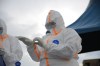 Ebola response teams organize a public demonstration to raise awareness about the Ebola virus disease in Beni, North Kivu province, eastern Congo, Tuesday, Sept. 22, 2026. (AP Photo/Sebastien Kitsa Musayi)