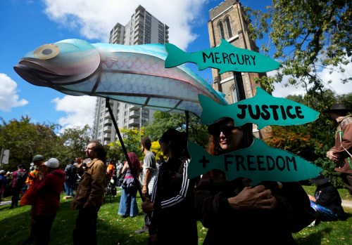 People protest seeking justice for mercury poisoning in Grassy Narrows First Nation, in Toronto, on Wednesday, Sept. 23, 2026. THE CANADIAN PRESS/Nathan Denette