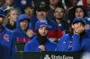 Chicago Cubs' Alex Bregman, center, looks on from the dugout during the ninth inning of a baseball game against the Miami Marlins Tuesday, Sept. 22, 2026, in Chicago. (AP Photo/Paul Beaty)