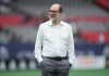 Vancouver Whitecaps CEO and Sporting Director Axel Schuster stands on the field before an MLS soccer match, in Vancouver, on Saturday, Aug. 1, 2026. THE CANADIAN PRESS/Darryl Dyck