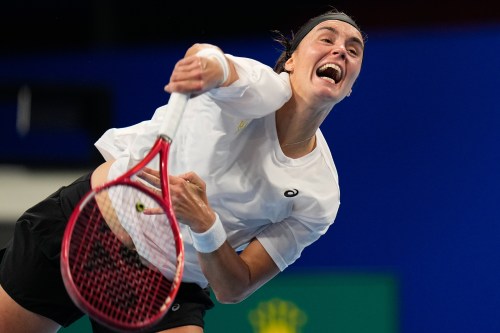 Ukraine's Anhelina Kalinina, returns a ball to Belgium's Jana Otzipka during the Billie Jean King Cup quarterfinals tennis match in Shenzhen, China's Guangdong province, Thursday, Sept. 24, 2026. (AP Photo/Andy Wong)