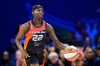 FILE - Connecticut Sun guard Saniya Rivers handles the ball during a WNBA basketball game against the Dallas Wings, Aug. 30, 2026, in Arlington, Texas. (AP Photo/Tony Gutierrez, File)