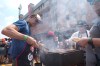 Participants grill meat during an attempt to break a world record for the most people cooking simultaneously at a barbecue at Loftus Versfeld Stadium, Pretoria, South Africa, Thursday, Sept. 24, 2026. (AP Photo/Alfonso Nqunjana)