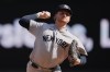 New York Yankees relief pitcher Clarke Schmidt delivers during the seventh inning of a baseball game against the Minnesota Twins, Wednesday, Sept. 16, 2026, in Minneapolis. (AP Photo/Abbie Parr)