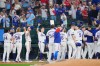 Texas Rangers players gesture following a baseball game against the New York Mets, Thursday, Sept. 24, 2026, in Arlington, Texas. (AP Photo/Julio Cortez)