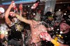 San Diego Padres' Manny Machado, center, celebrates with teammates after the Padres clinched a wildcard spot following a baseball game against the Los Angeles Dodgers, Thursday, Sept. 24, 2026, in Los Angeles. (AP Photo/Mark J. Terrill)